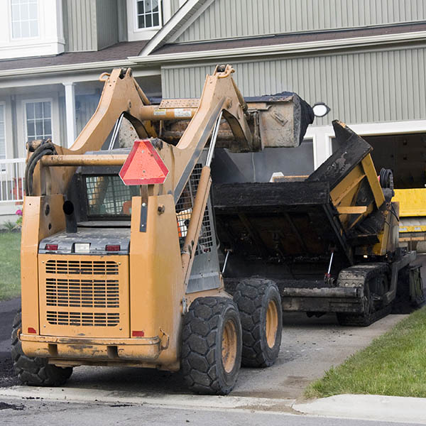 asphalt machine with asphalt and paving driveway