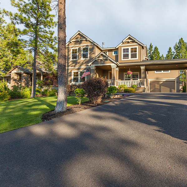 Front elevation and driveway of a beautiful home.